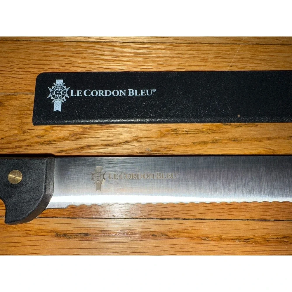 Vintage Sabatier France 10-inch serrated LeCordon Bleu knife, made in France.